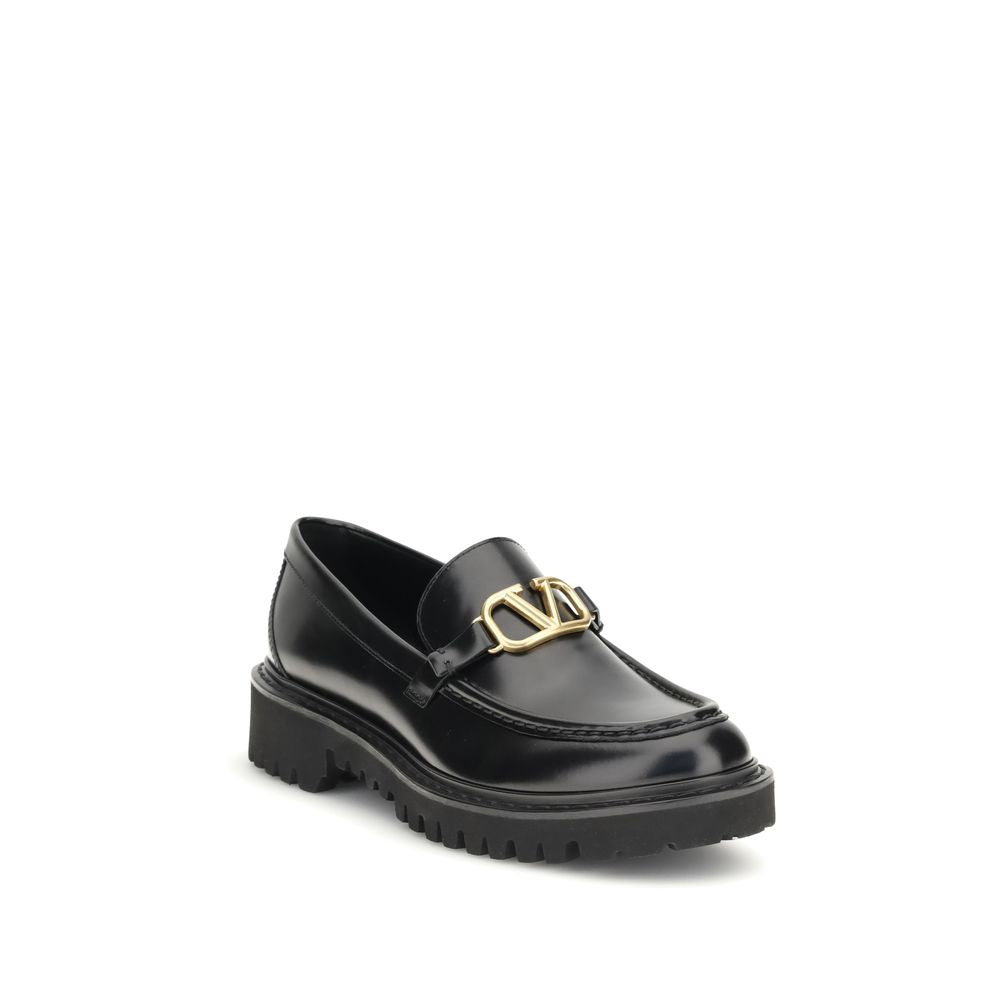 Sorte slip-on loafers i læder